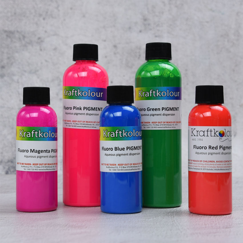 Kraftkolour fluro pigment bottles in magenta, pink, blue, green and red